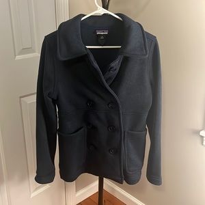 Women’s navy Patagonia knit jacket.